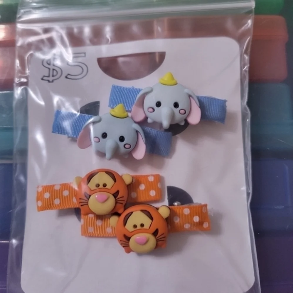 4 pc hair clips Dumbo & Tigger‎